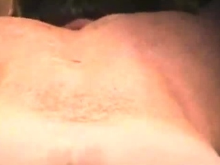 DARBY ON HER BACK PLAYING WITH HER PUSSY
