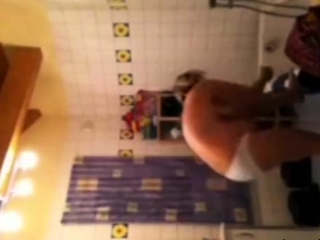 Spying on stepmom as she lotions her body